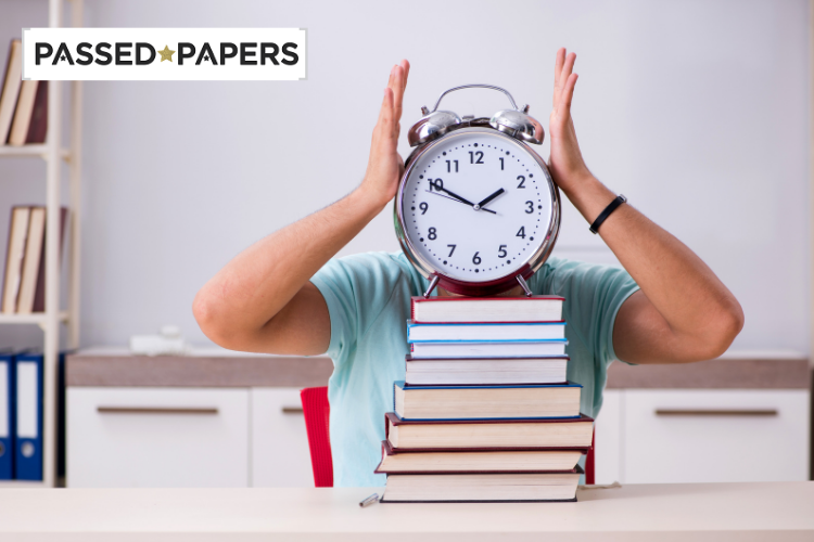 11 plus verbal reasoning papers. Boy with clock and stack of books